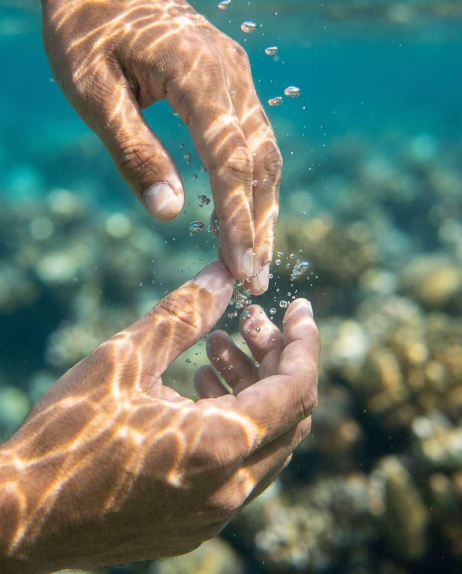 Hands in Caustic Light AI portrait example — Gemini AI Underwater Prompt